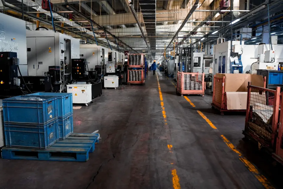 Factory production floor with machinery and pallets